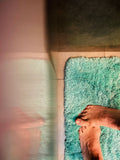 Diatomite stone bath mat in a bright natural bathroom