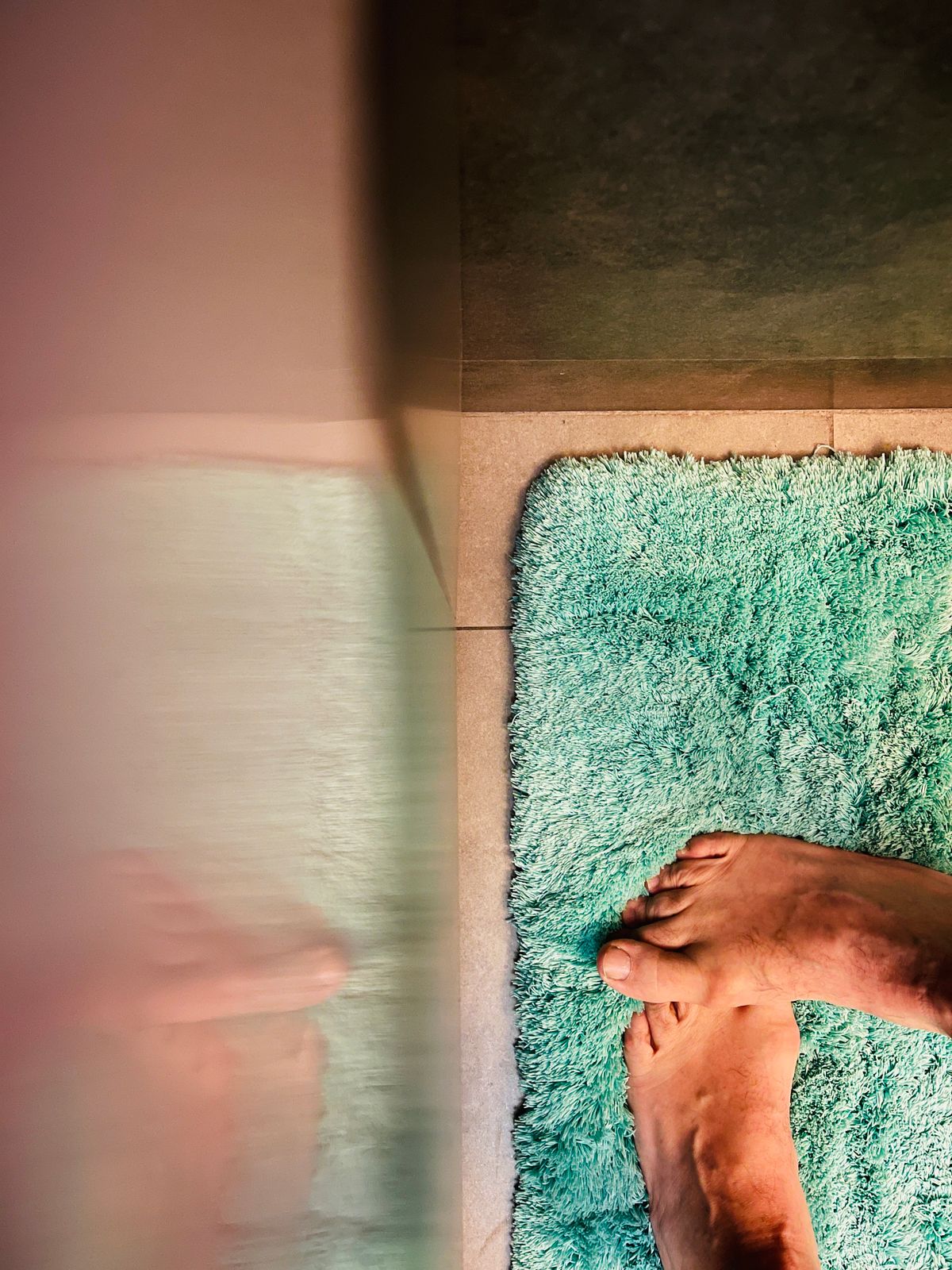 Diatomite stone bath mat in a bright natural bathroom